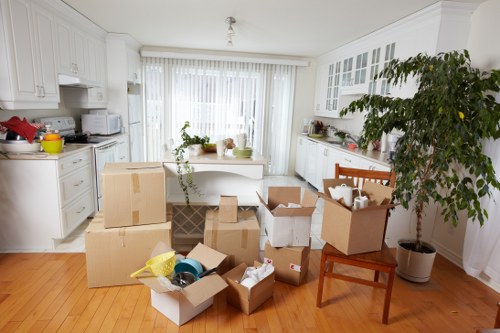 Prepared moving boxes and labeled household items ready for transport