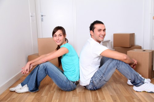 Boxes and furniture being loaded for a Chinatown home relocation