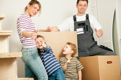 Packed boxes and furniture ready for local removal service