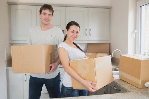 Furniture and boxes being prepared for a local removal service